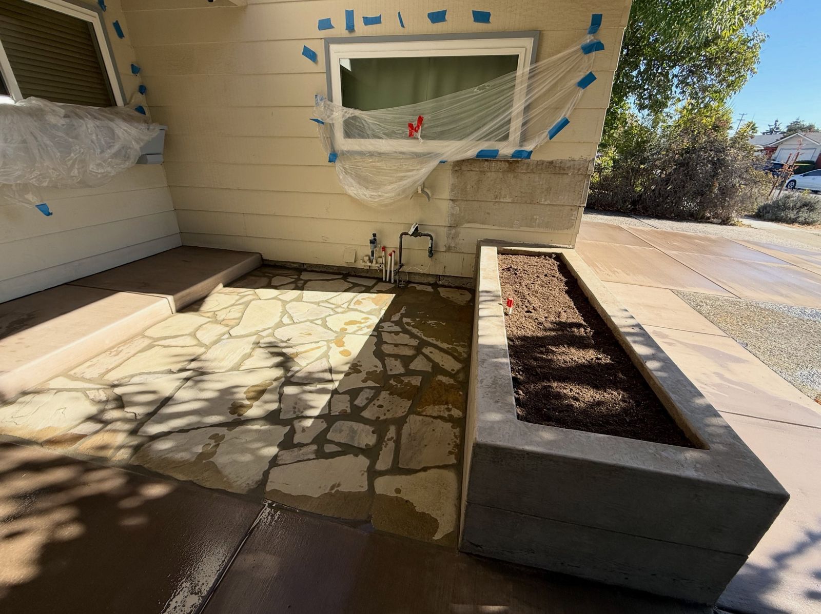 Backyard patio area being prepped before new concrete